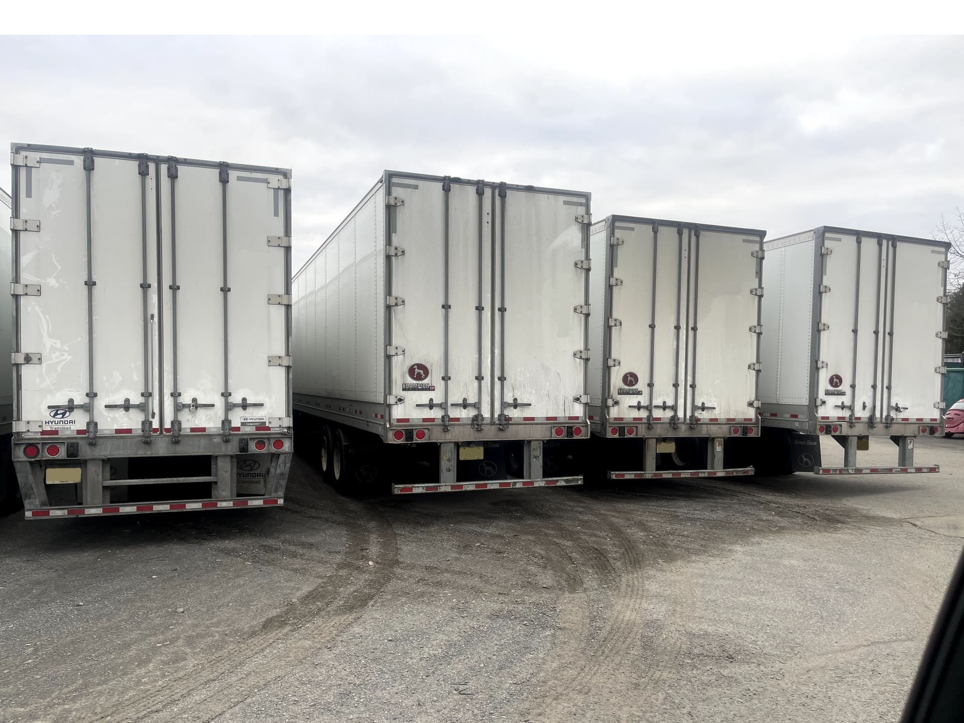 Delex LLC trucks at warehouse